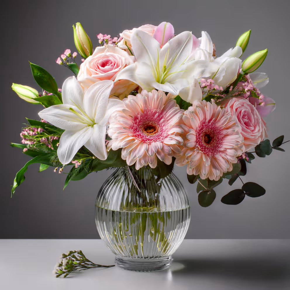 A cheerful mix of colorful fresh flowers, celebrating joy and nostalgia.